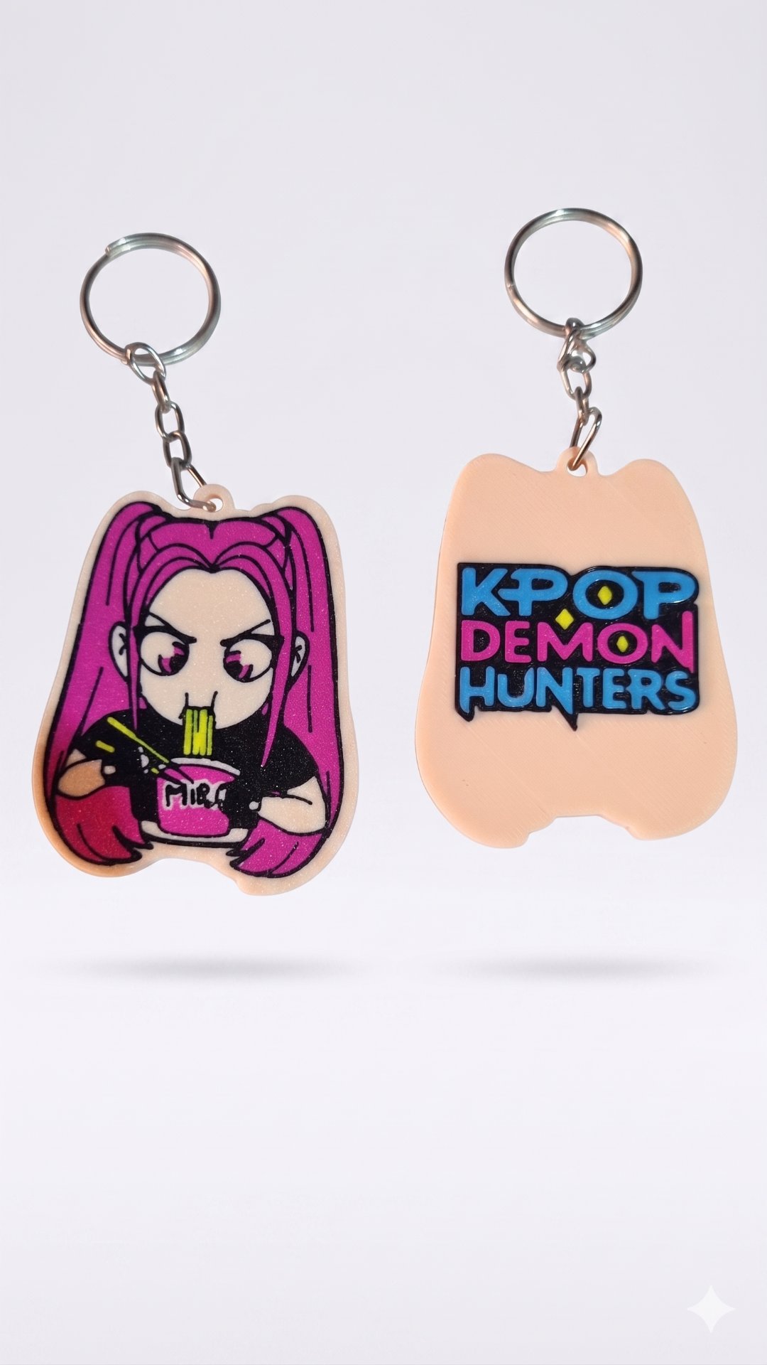 Llavero K-POP DEMON HUNTERS  rostro y logo 6